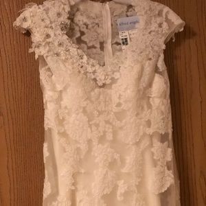 Sweet lace, vintage-inspired ivory wedding dress